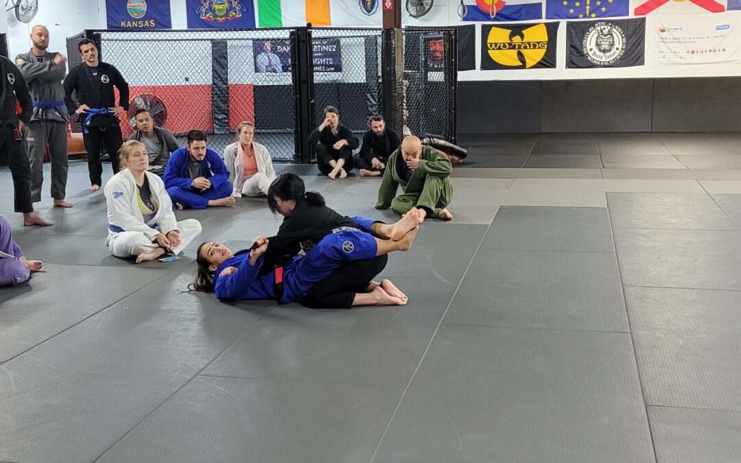 Bia Mesquita demonstrates a technique from guard.